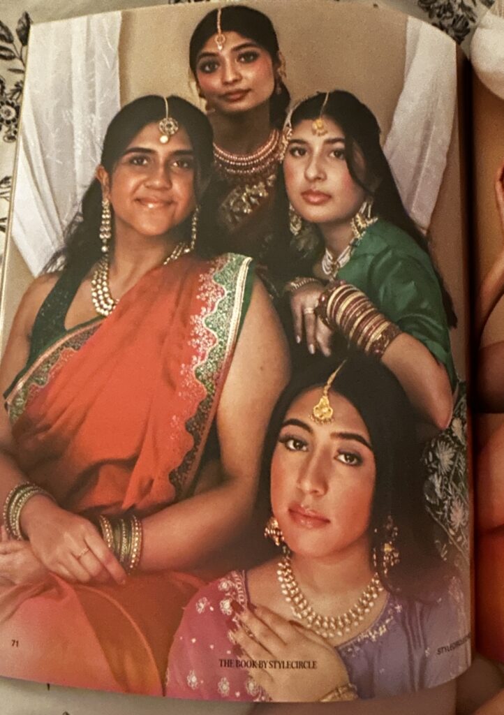 Four South Asian women are participating in a photoshoot for the magazine. 